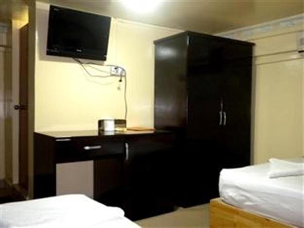 Golden Boat Guesthouse Phnom Penh Rom bilde